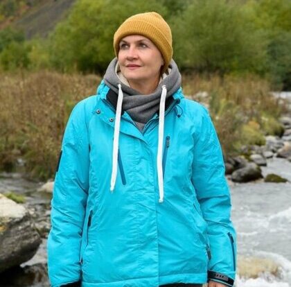 Woman in blue waterproof jacket