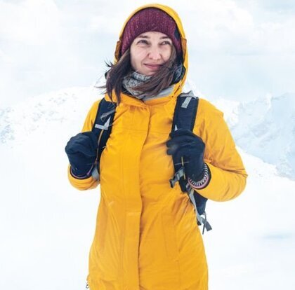 Woman in yellow winter jacket