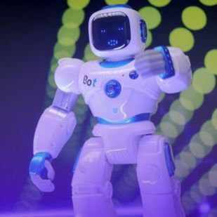 a small white robot with blue accents stands against a colorful background featuring glowing eyes and an outstretched arm